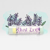 Lip balm tube with clear plastic, yellow balm, and Just Bee Renewed text