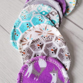 Makeup remover pads, various colors and patterns, with white stitching