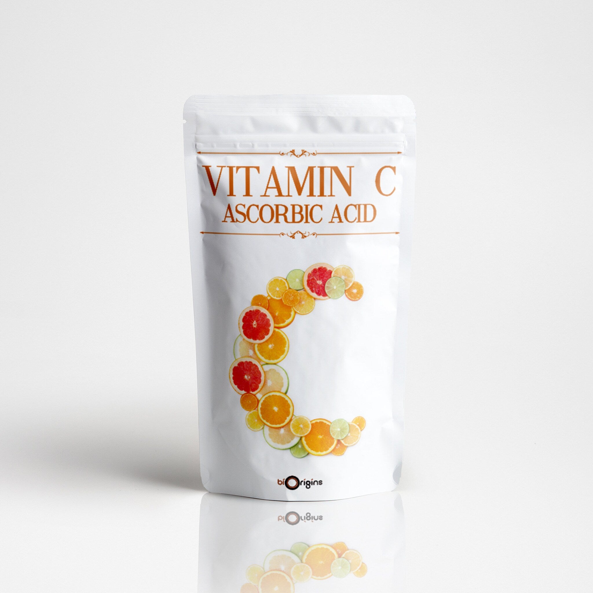 Amber glass bottle of pure vitamin C serum with gold dropper and minimalist black label