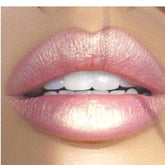 Lip balm, light pink lips, glossy finish, visible teeth