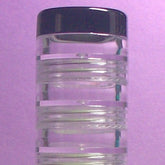 Stack of 10 round 5g eyeshadow jars with clear lids showing assorted matte and shimmer powder colors