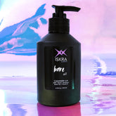 Facial cleanser bottle, black pump, label with "bare all" text, on iridescent background