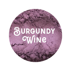 Burgundy Wine powder with textured surface and white text overlay, round shape