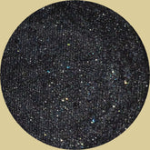 Square palette with nine vibrant eye shadows in matte and shimmer finishes, arranged in three rows of three.