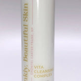 Facial cleanser bottle, white with gold text, Frankly, Beautiful Skin brand