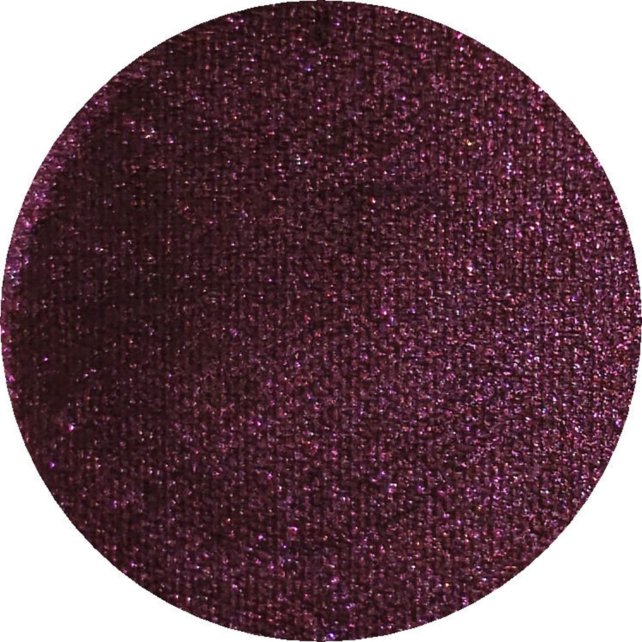 Close-up of Invoke Thee Eye Shadow palette showing six vibrant matte and shimmer shades in a sleek black compact