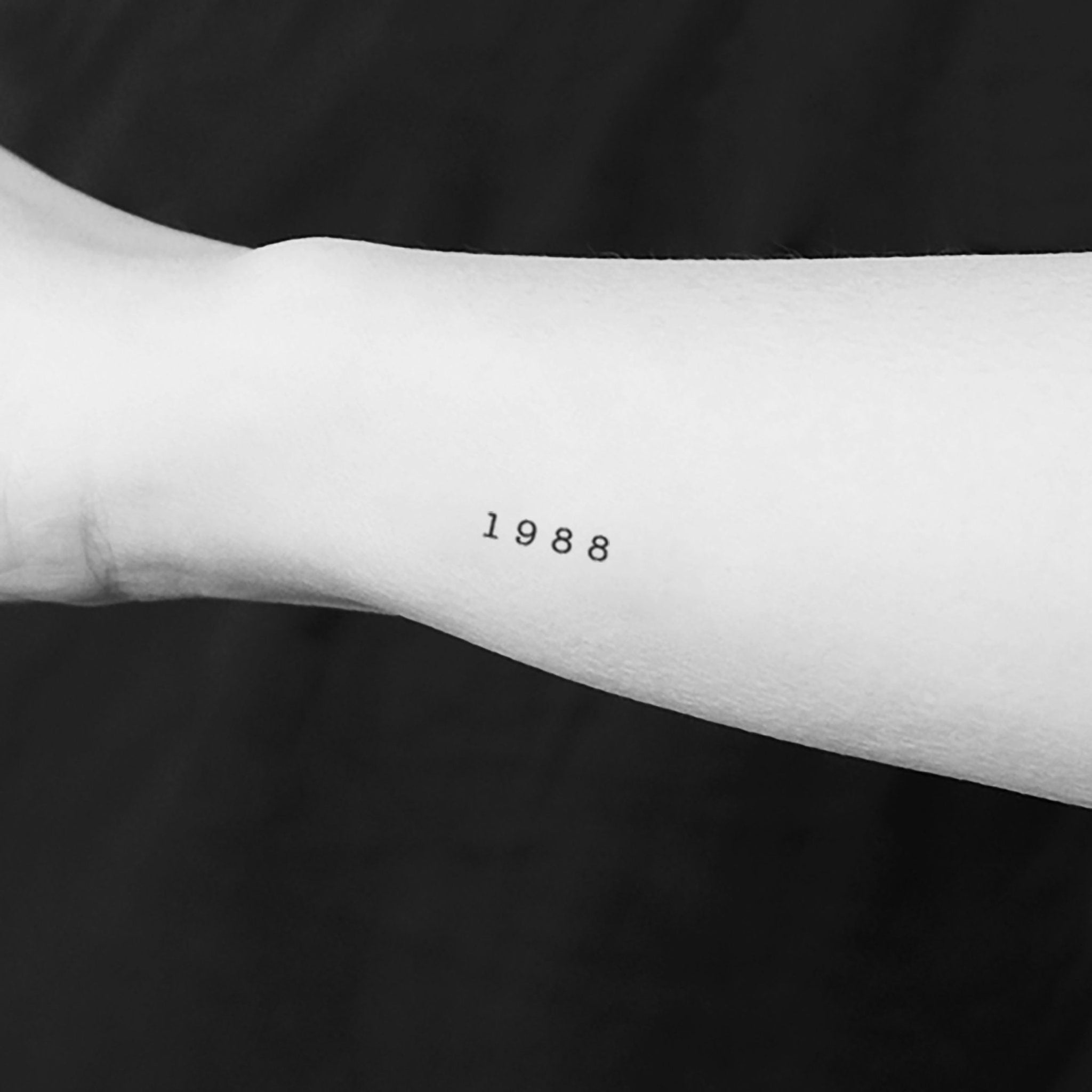 Elegant sheet of 1988 birth year temporary tattoos with delicate gold detailing on skincare-safe adhesive backing