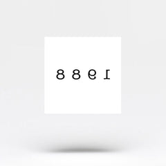 Close-up of delicate 1988 birth year temporary tattoo applied on wrist with natural skin texture visible