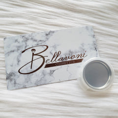 Bellavoni Cosmetics card with marble pattern, brown text, and silver makeup container on white fur background