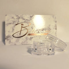 Clear jar with lid, marble pattern box with "Bellavoni" branding in gold lettering