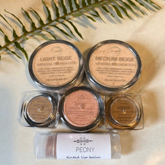 Mineral makeup set with beige powder, blush, and lip balm, Earth Mineral Cosmetics