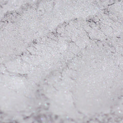 Eyeshadow silver gray with lavender shimmer, close-up of textured powder