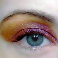 Close-up of Cherry Sky Vegan Eye Shadow showing rich pink hue with smooth matte finish in compact case