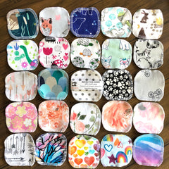 Reusable facial rounds with assorted patterns and white stitching, LanCraftUS