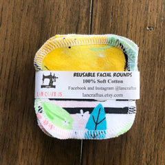 Reusable facial rounds with yellow, patterned fabric and white stitching, LanCraftUS brand