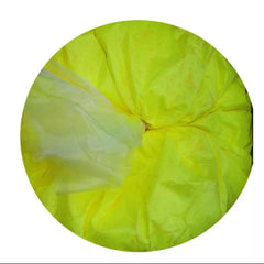 Yellow and white crumpled fabric, circular shape, possibly packaging material