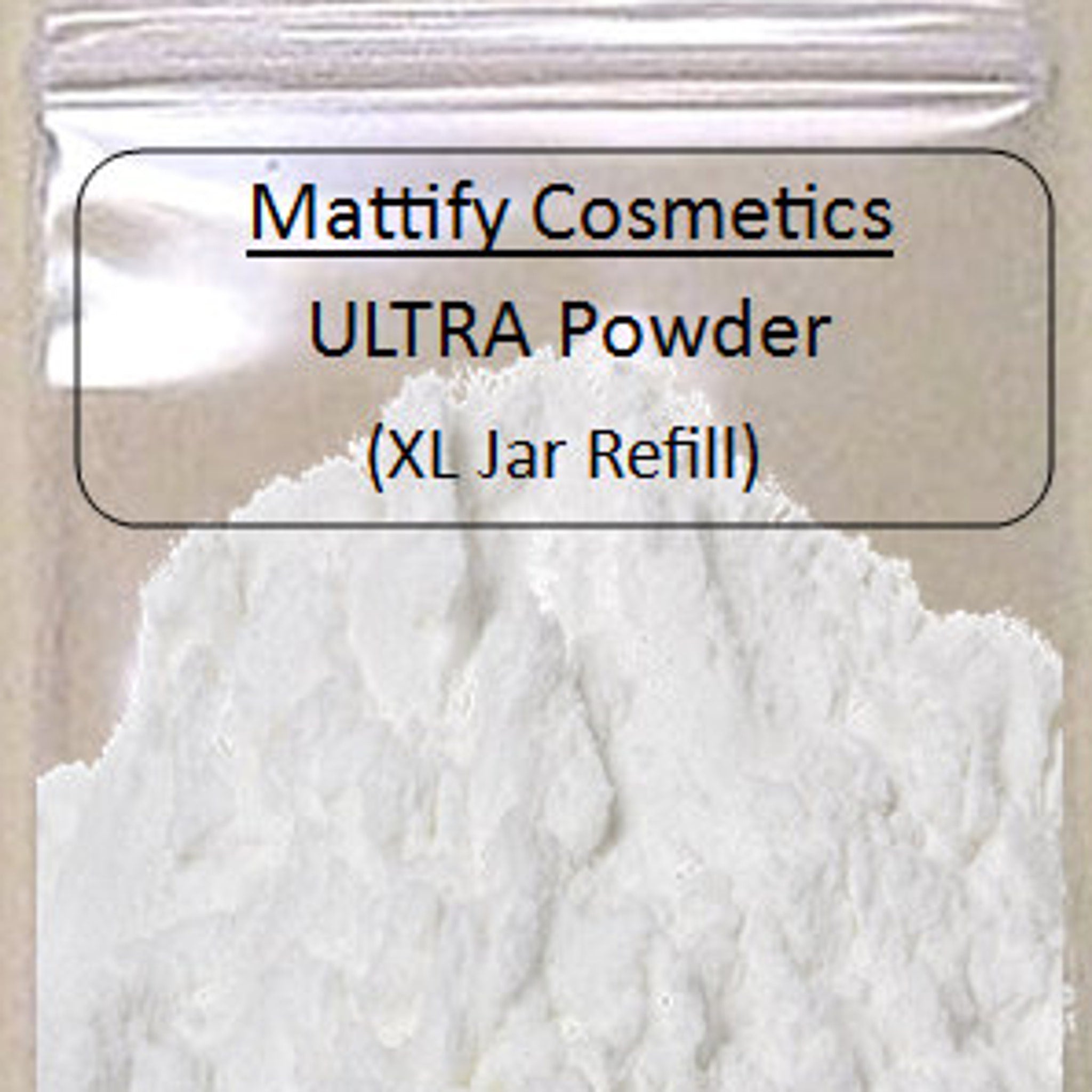 Face powder, white powder, clear plastic bag, "Mattify Cosmetics ULTRA Powder" text