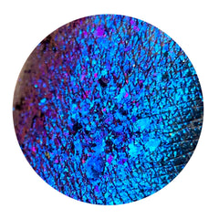 Close-up of Tala Foil Thunderstorm Eye Shadow Pigment in metallic silver-blue shade with reflective foil finish, 2ml size