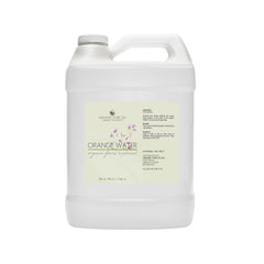 Body mist in white plastic jug with handle, Organic Pure Oil brand label