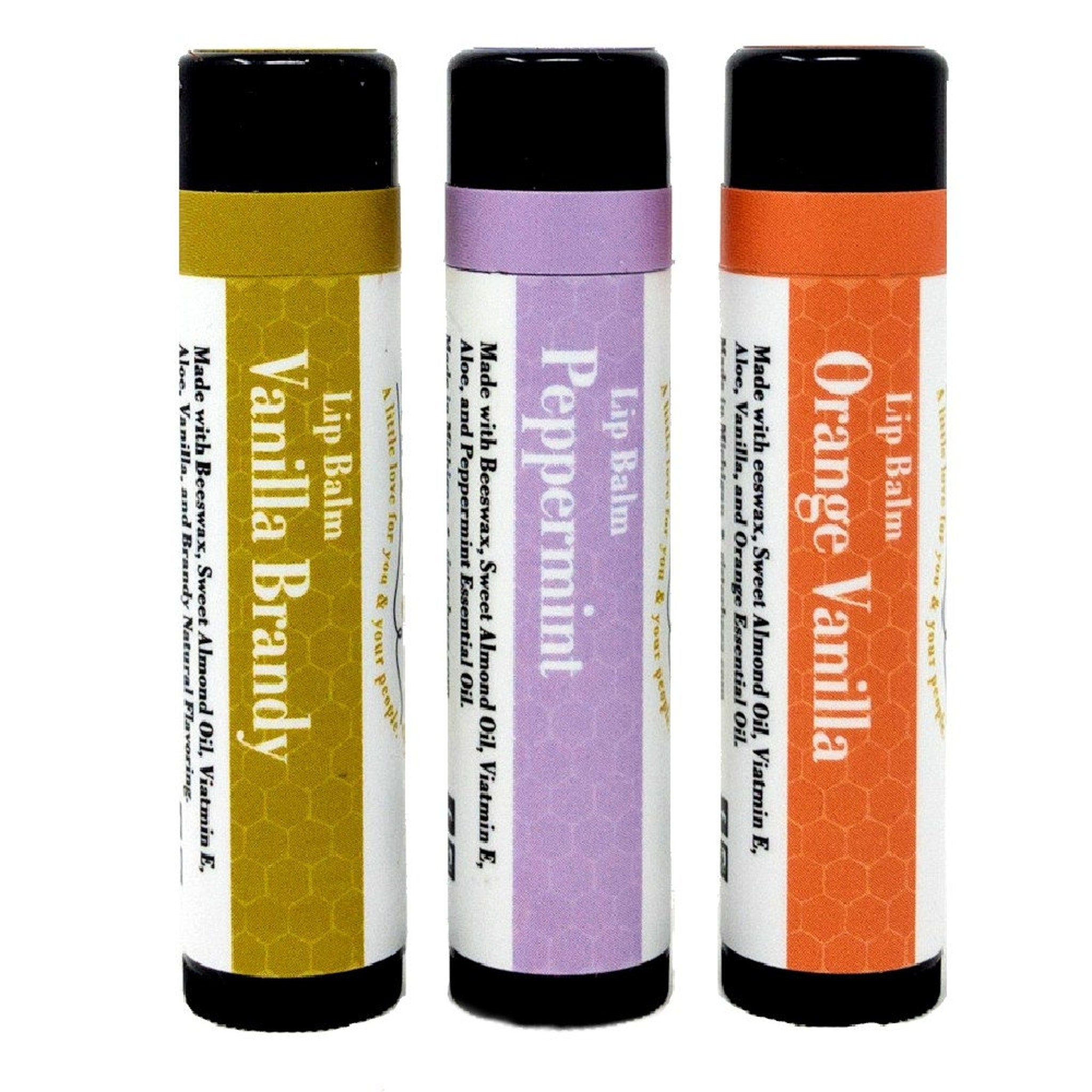 Lip balm set with black caps, colorful labels, and Sister Bees text visible
