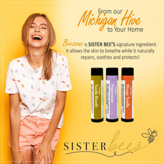 Lip balms with yellow, purple, and orange labels, Sister Bees brand, with woman smiling in background