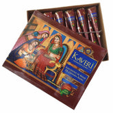 Twelve natural brown henna cones for skincare arranged in a circular pattern on a wooden tray