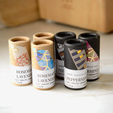 Lip balms in cardboard tubes with patterned paper, The Soap.Bar brand on label
