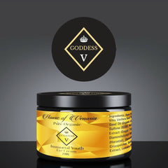 Eye cream jar with black and gold label, black lid, and "GODDESS V" branding visible.
