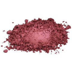 Loose powder eyeshadow in burgundy color with a metallic finish and granular texture