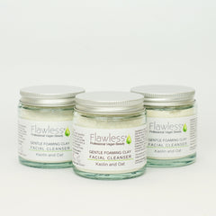 Gentle Foaming Clay Facial Cleanser in glass jars with silver lids, labeled "Flawless" brand