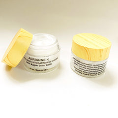 Eye cream in glass jar with wooden lid, white cream visible, "ADRIANNE K" label