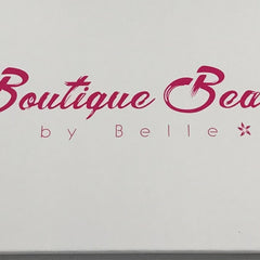 Close-up of 15 vibrant tropical eyeshadows in matte and shimmer finishes, arranged in a sleek rectangular palette