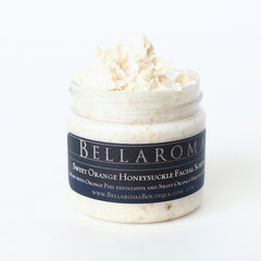 Facial scrub in glass jar with white and tan color, textured appearance, and BellaRoma label