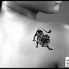 Close-up of Leo zodiac temporary tattoo showing intricate lion design with metallic gold accents on skin-safe adhesive