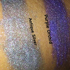Close-up of vibrant purple orchid eyeshadow pan with soft satin finish and vegan organic formula