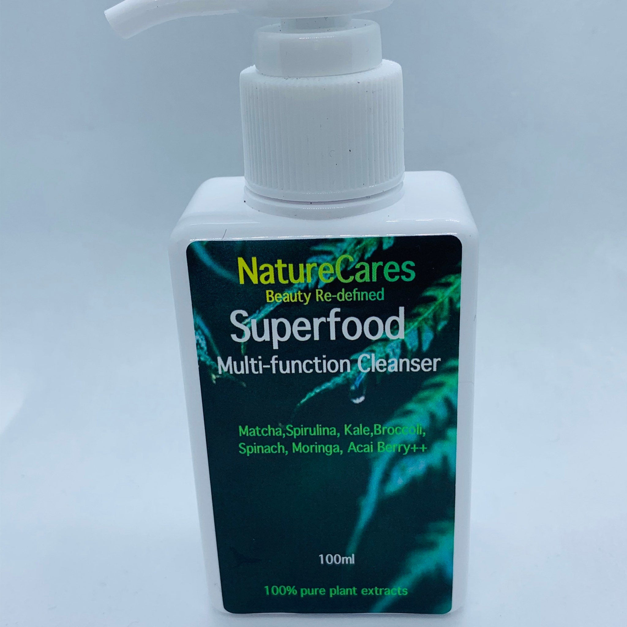 Facial cleanser white plastic bottle with pump and green label, NatureCares branding visible