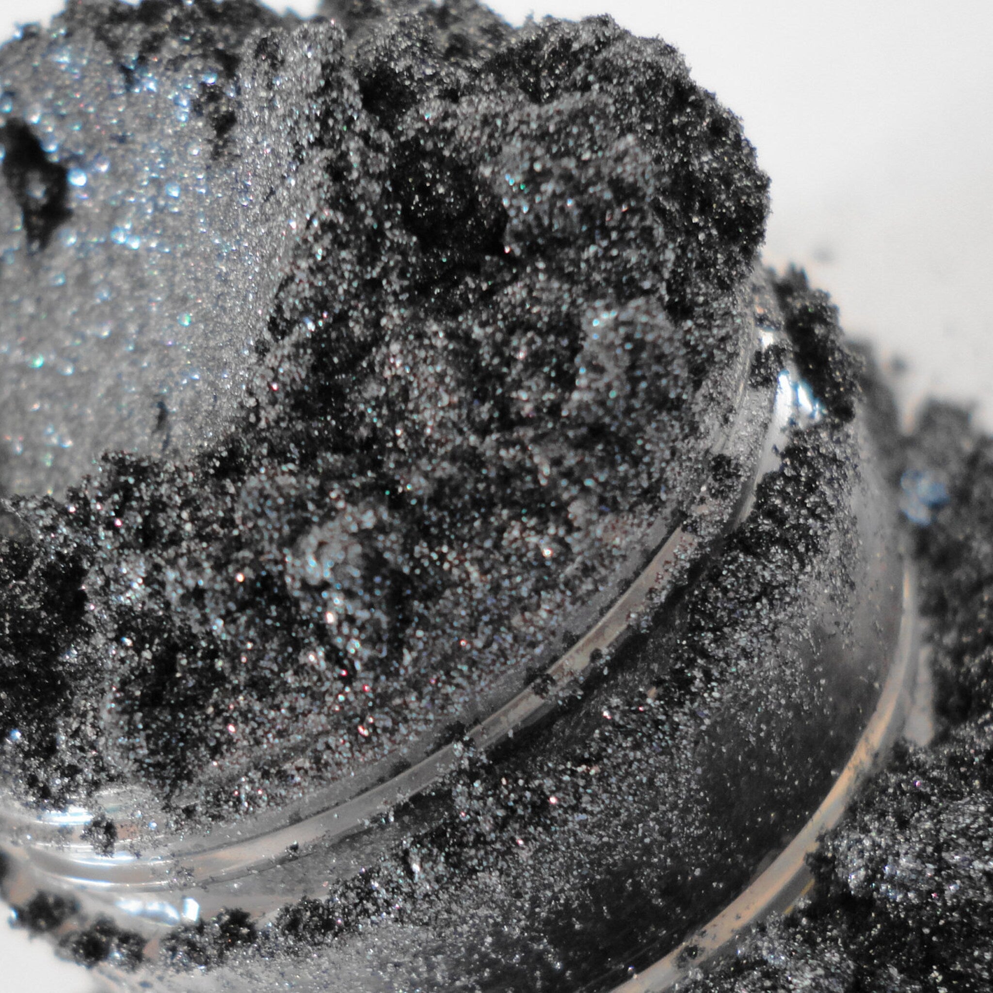 Silver-gray shimmer eyeshadow in a sifter jar with glitter particles, vegan mineral makeup