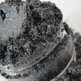 Silver-gray shimmer eyeshadow in a sifter jar with glitter particles, vegan mineral makeup
