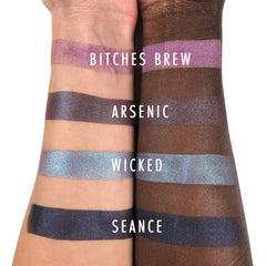 Eyeshadow swatches, various metallic shades on skin, Concrete Minerals text visible