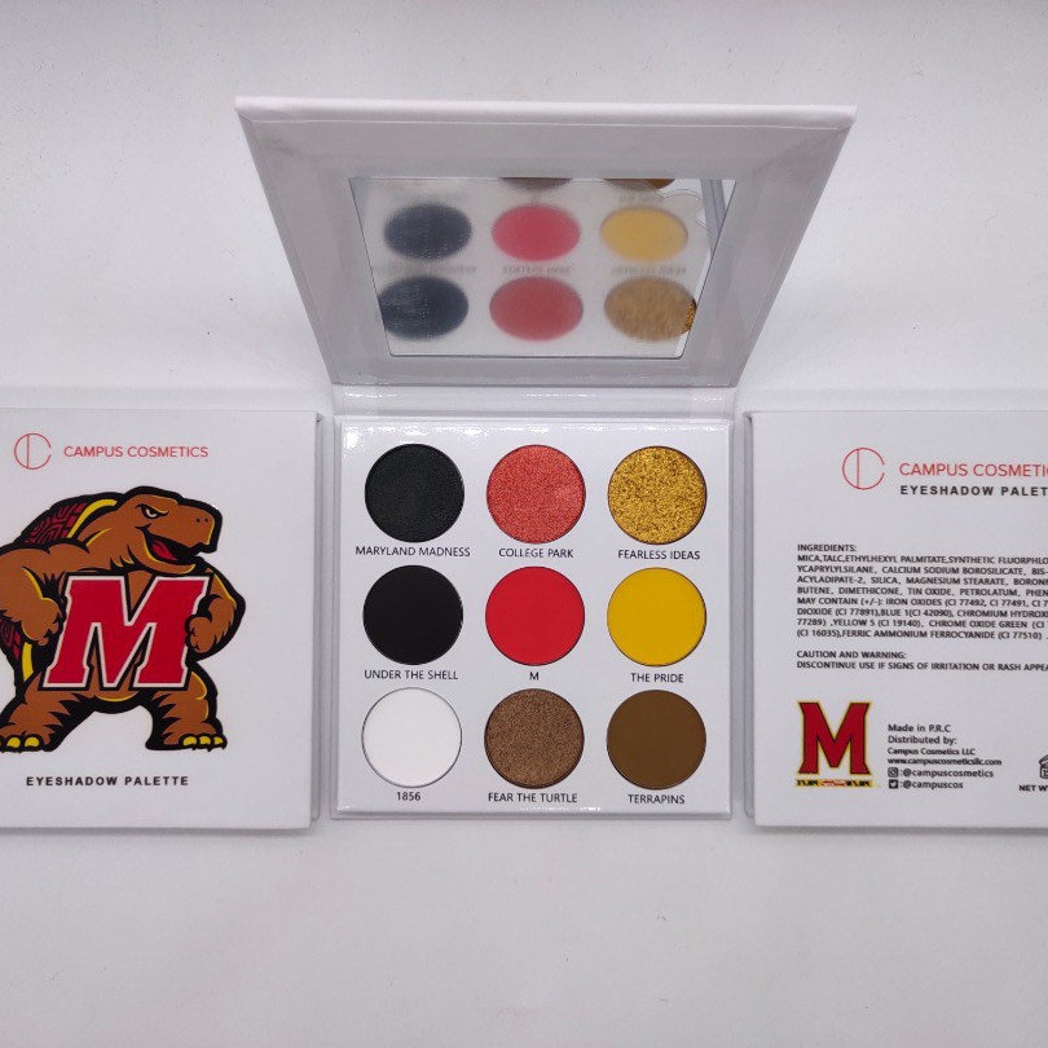 Maryland University Eye Shadow palette with four matte shades in navy, gold, white, and red