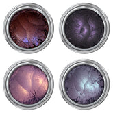 Mineral eyeshadow, four circular containers with metallic silver rims, various shades of shimmering color
