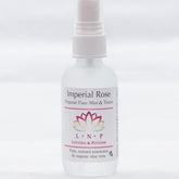 Facial toner spray bottle, white plastic, "Imperial Rose" label, "Lotions & Potions" brand