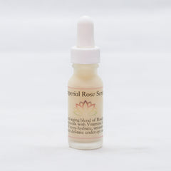 Rose serum bottle with white dropper, beige liquid, and "Imperial Rose Serum" text label