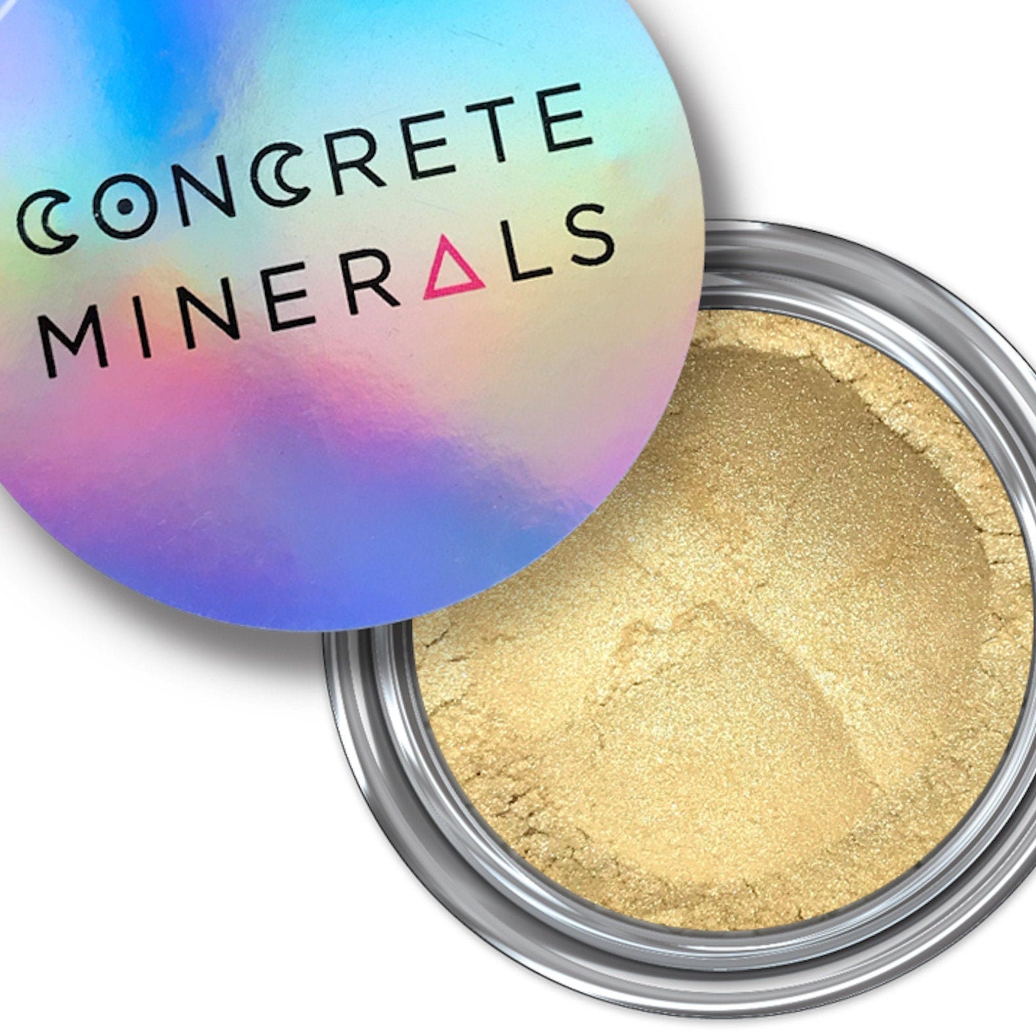 Eyeshadow makeup product with gold metallic powder, holographic lid, and Concrete Minerals brand text