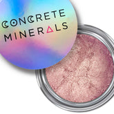 Metallic eyeshadow, pink powder, silver container, Concrete Minerals logo on lid