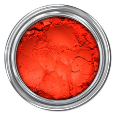 Red powder in a silver metal can, showing texture and color