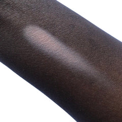 Skin tone swatch with dark brown skin and light pink swatch, showing texture and color