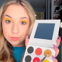 Close-up of Maryland University Eye Shadow palette showing shimmering bronze and plum shades with smooth, blendable texture