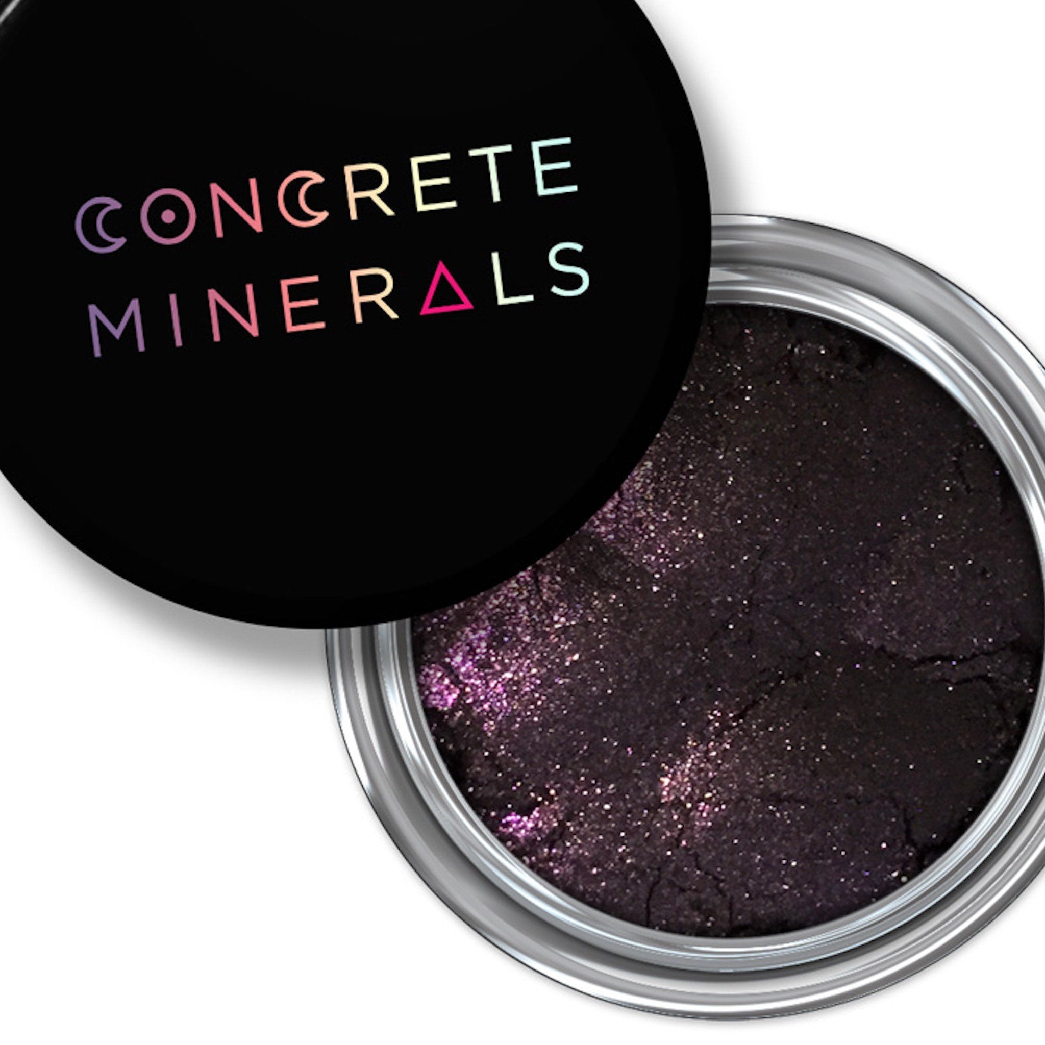 Mineral eyeshadow, dark purple with shimmer, in a silver container, Concrete Minerals brand