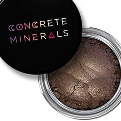 Mineral eyeshadow in dark brown with silver shimmer, in a metal container, Concrete Minerals brand